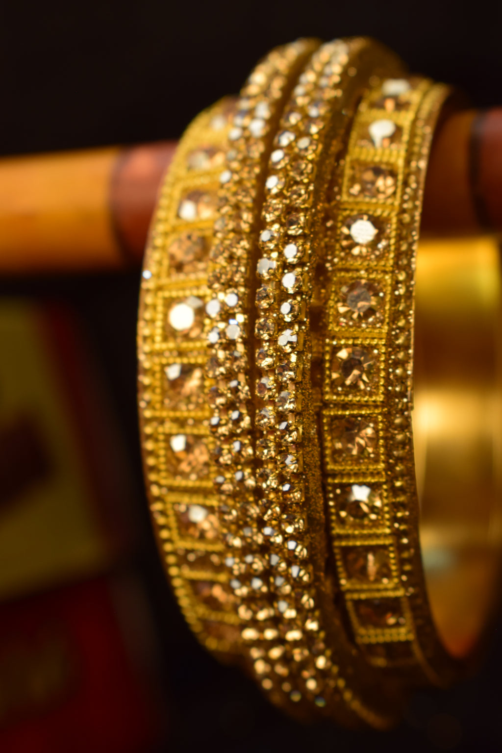 Luxurious Gold-Toned Statement Bangles with Amber Crystals